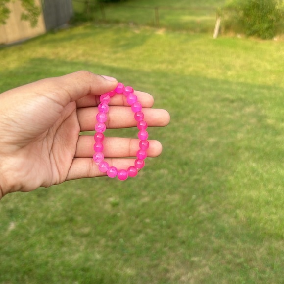 I will be selling these pink bracelets 2$ each - Picture 2 of 4